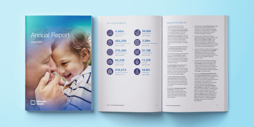 Two printed documents laid flat on a bright turquoise background. One is closed showing the front cover, the other open to display the inner pages. The front cover reads Annual Report 2024-2025 and Monash Health's logo in white sits discreetly in the bottom left corner. The cover image is a close-up of a smiling parent and child. The child is resting their forehead against their parent's and touching their face. The parent covers the child's small hand with their own larger one lovingly.