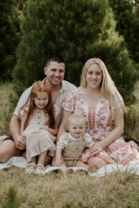Mitchell with his parents and sister.