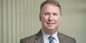 Professor Rod Hunt looks directly at camera