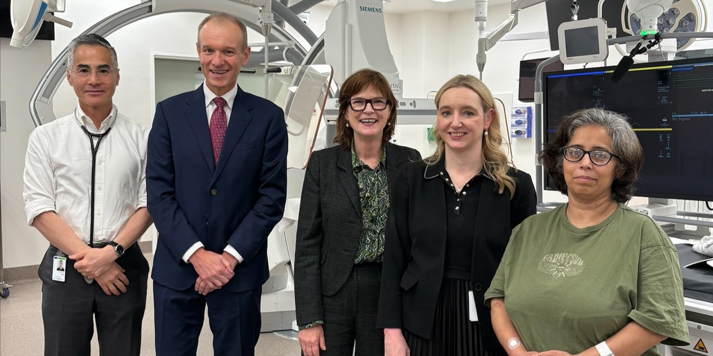 Five people standing together in a cath lab at the Victorian Heart Hospital