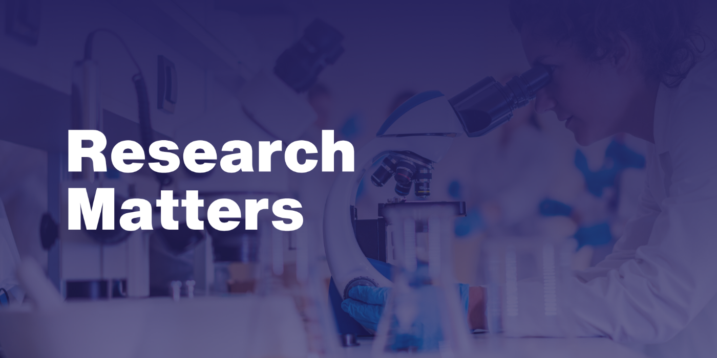 Image with the words 'Research matters', with a person in the background looking through a microscope