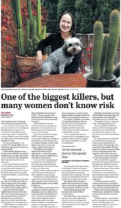 A clipping from The Age newspaper. The headline reads,' One of the biggest killers, but many women don't know risk'. the article features a photo of a smiling woman in her 50s sitting at a patio table with a dog on her lap.
