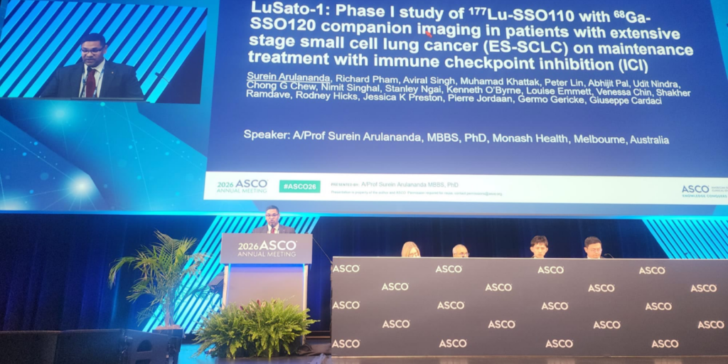 Associate Professor Surein Arulananda presenting clinical study results on lung cancer treatment at the 2024 ASCO Annual Meeting.
